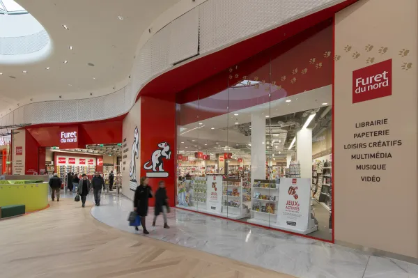 LED spotlights accentuate the bestsellers in the entrance of the bookstore Le Furet du Nord.