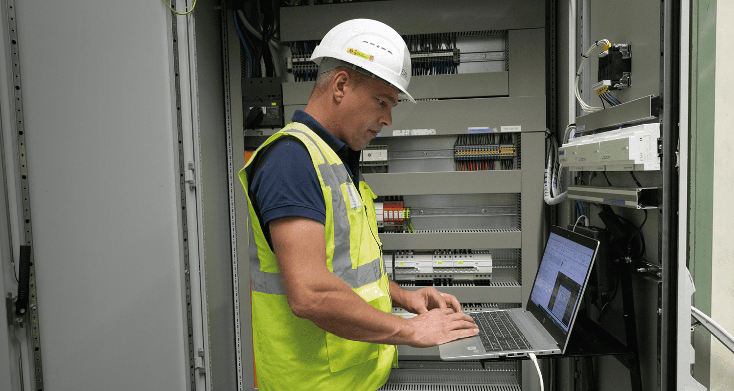 Team of professionals working on lighting system installation